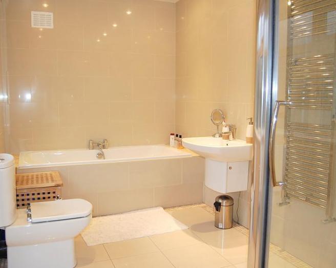 modern half tiled bathroom