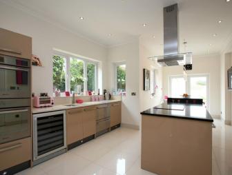 kitchen tv mounted island plan open tiles rightmove doors french luxury nice