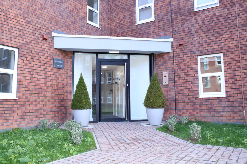 Main image of property: Crescent House, Woodside Park, Rugby, CV21 2NZ