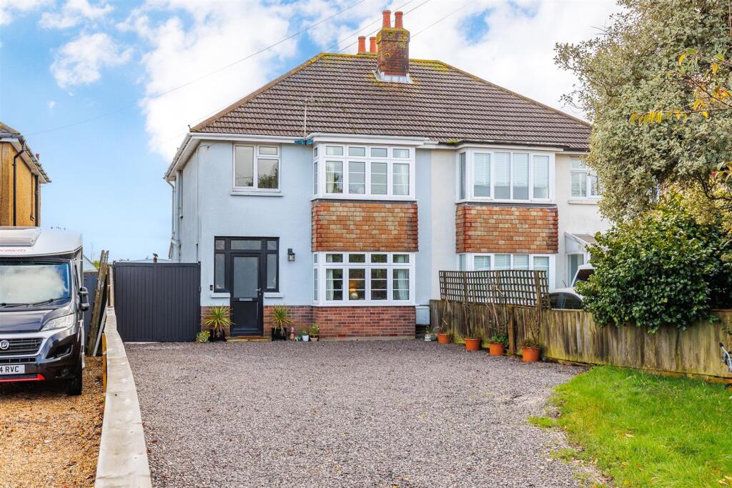 Main image of property: EXTREMELY WELL PRESENTED WITH GARDEN ROOM  - Newport Road, Northwood, Cowes