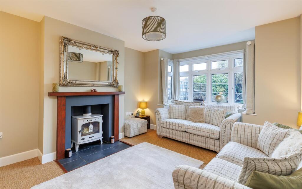 Main image of property: EXTREMELY WELL PRESENTED WITH GARDEN ROOM  - Newport Road, Northwood, Cowes