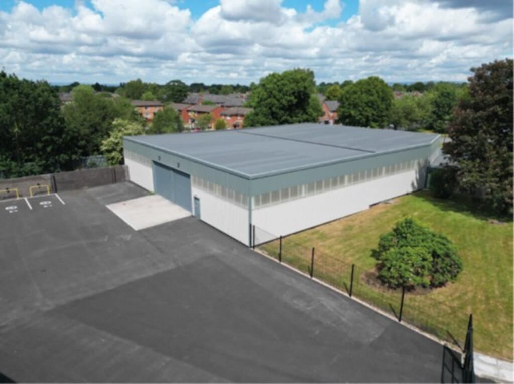 Main image of property: Unit A Hanover Industrial Estate, Tudor Road, Altrincham Business Park, Altrincham, WA14 5RZ