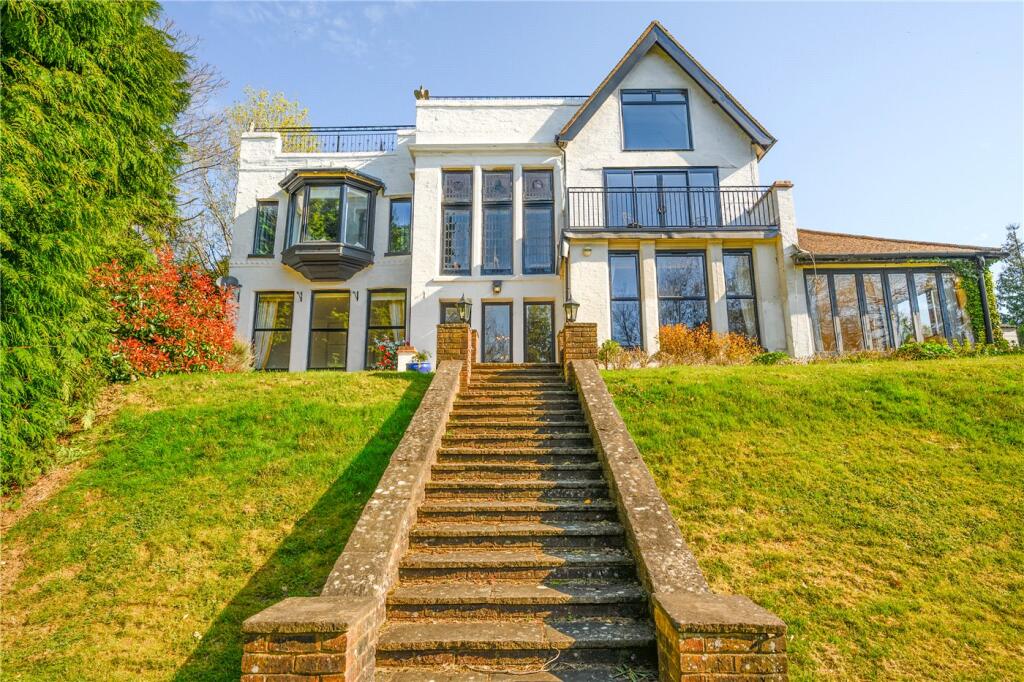 Main image of property: Cobbetts Hill, Weybridge, Surrey, KT13