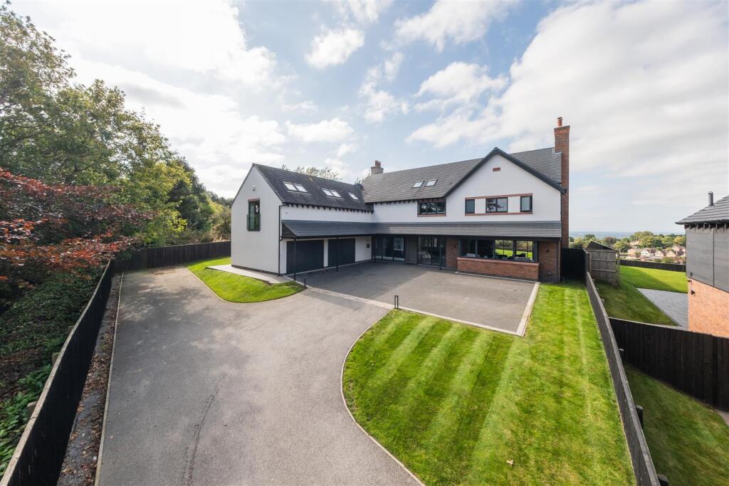 Main image of property: An individually designed and contemporary detached family home in Kelsall