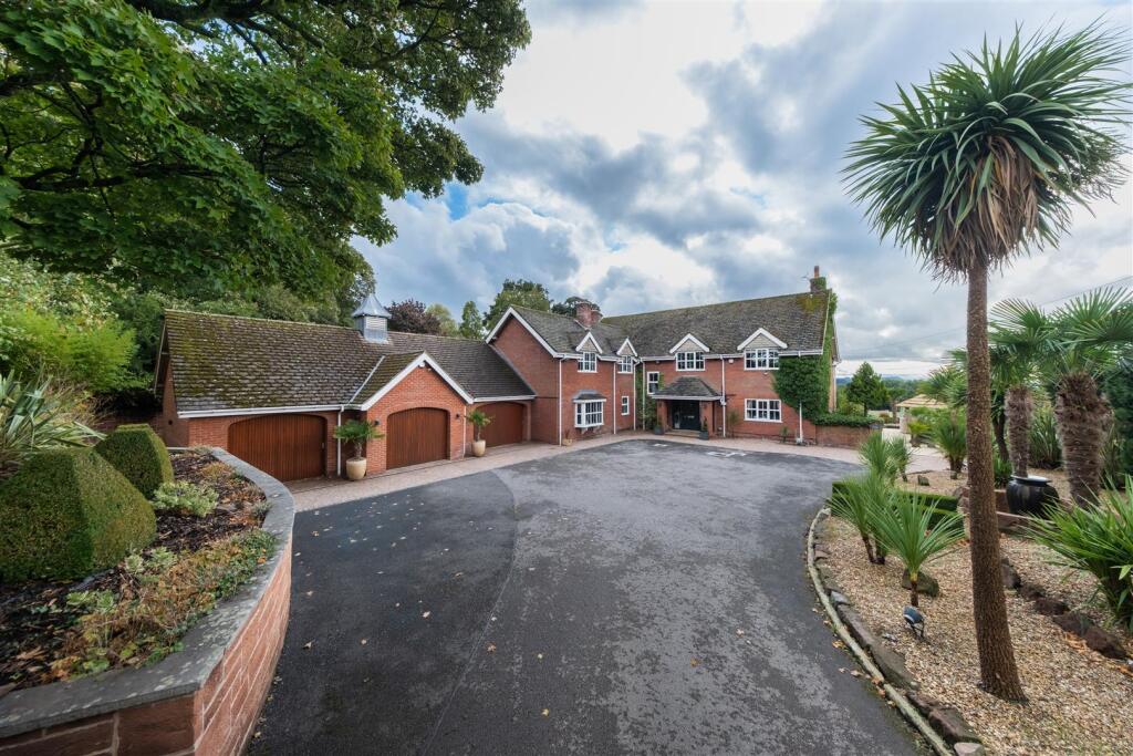 Main image of property: A stunning country home with breathtaking elevated views of five Counties