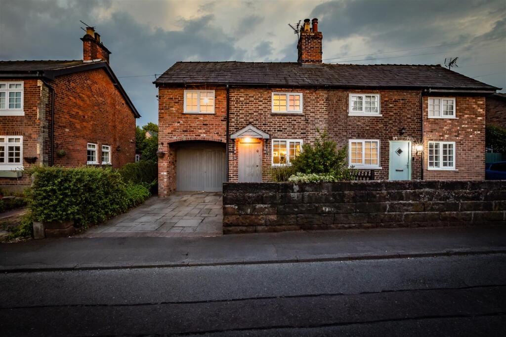 Main image of property: Enchanting period cottage with idyllic south-facing gardens