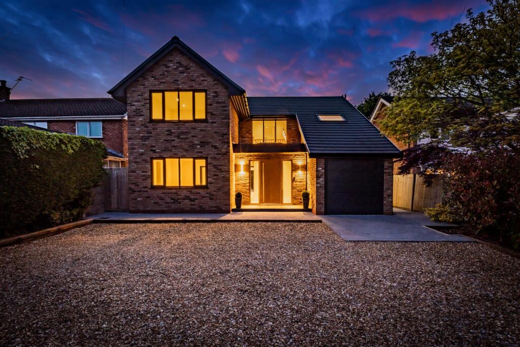 Main image of property: Immaculately presented detached property with a prodigious south-facing rear garden