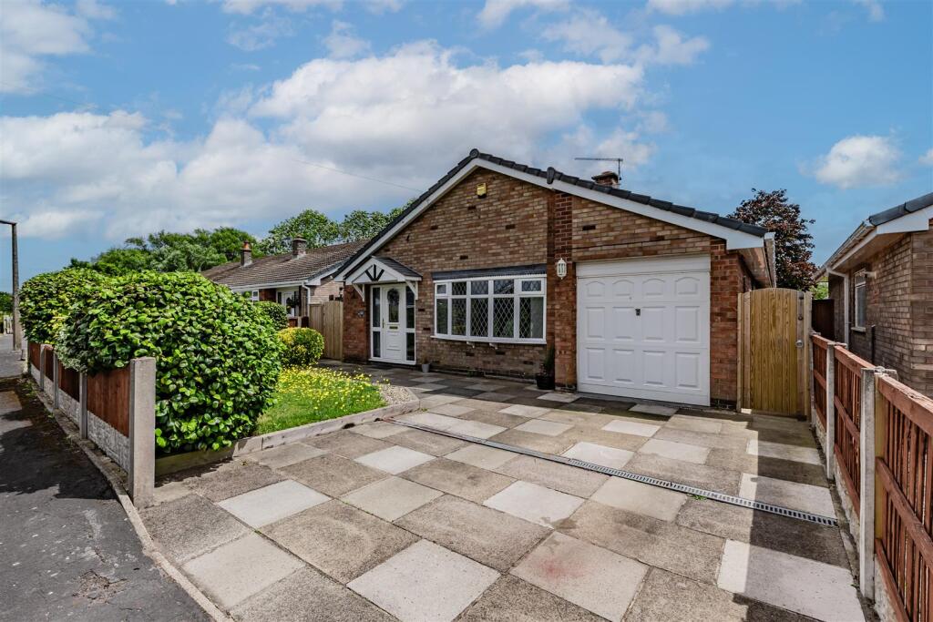 Main image of property: Detached bungalow on a quiet cul-de-sac in semi-rural village