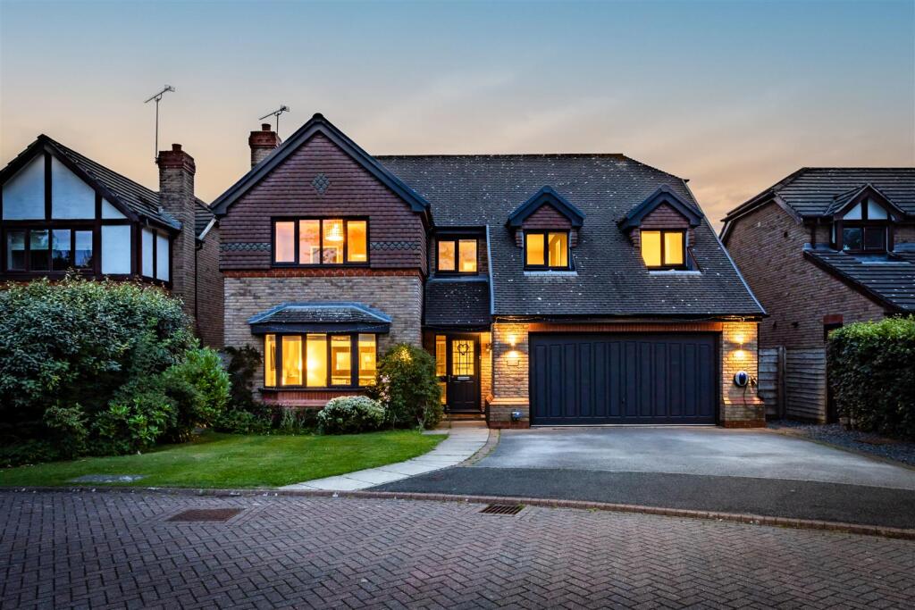 Main image of property: Prestigious detached property tucked away on a quiet leafy cul-de-sac