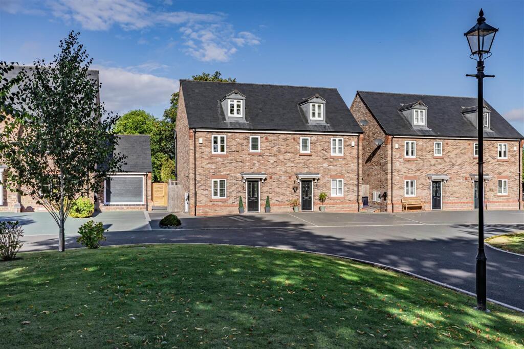 Main image of property: Luxury three storey home sat within an exclusive small development