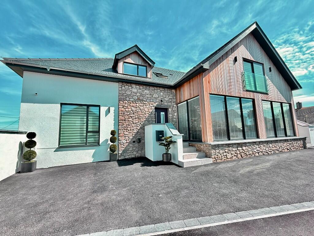 Main image of property: Sandy Lane, Rhosneigr, LL64