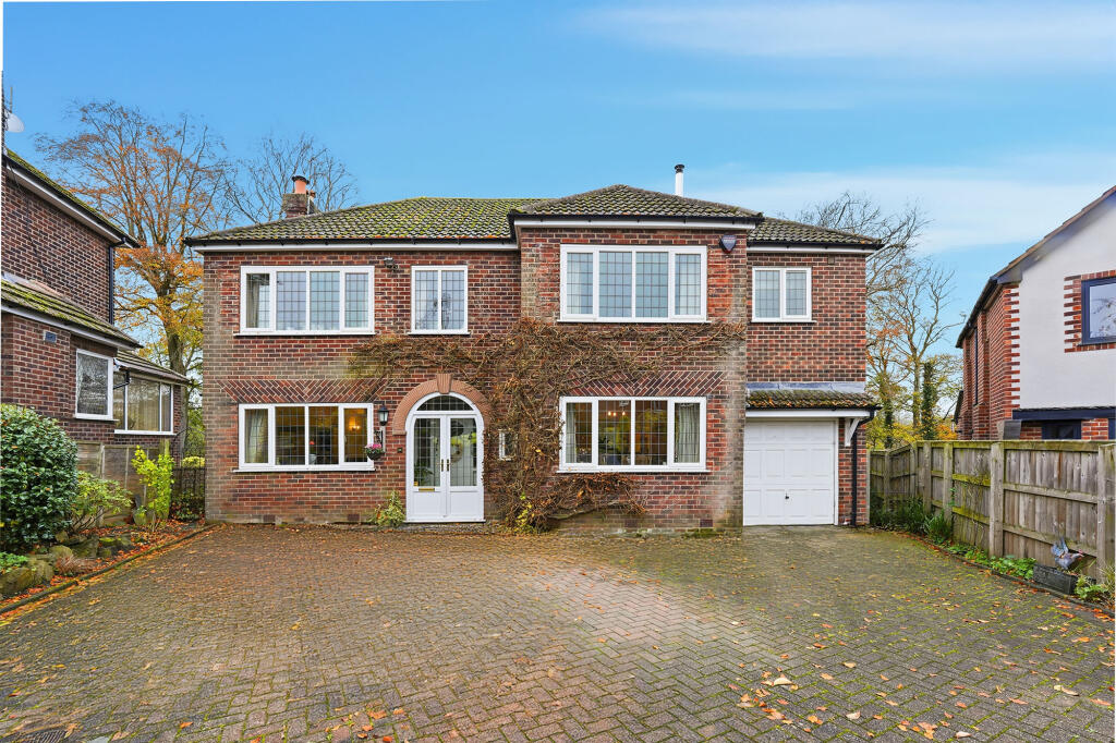 Main image of property: Woodlands Road, Handforth, SK9