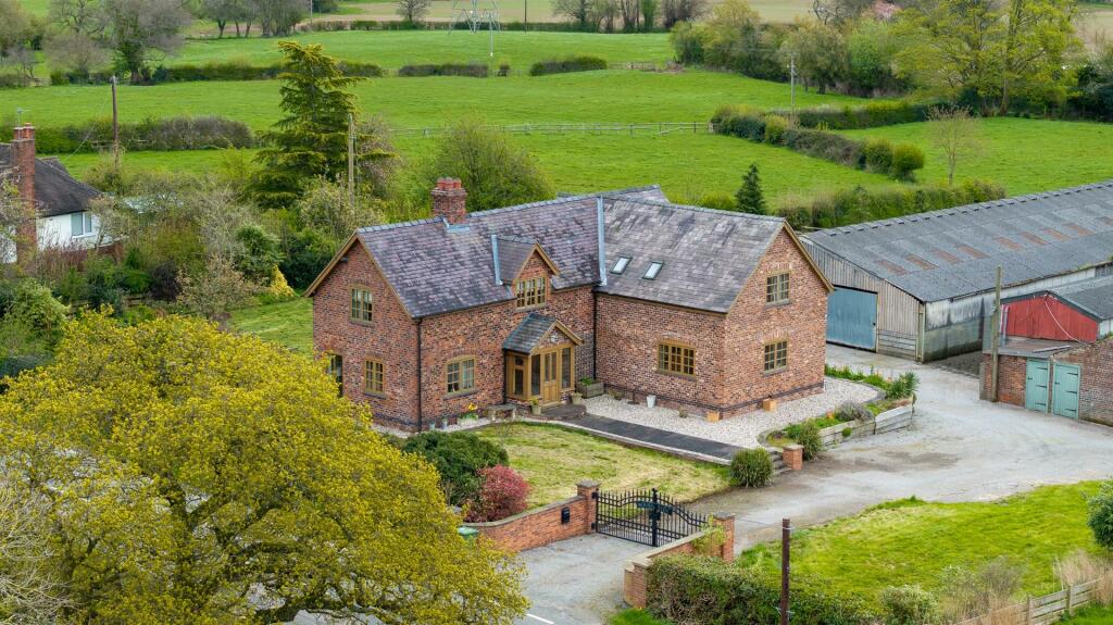 Main image of property: Woodside Farm, St. Martin's, Oswestry, SY11 3HD