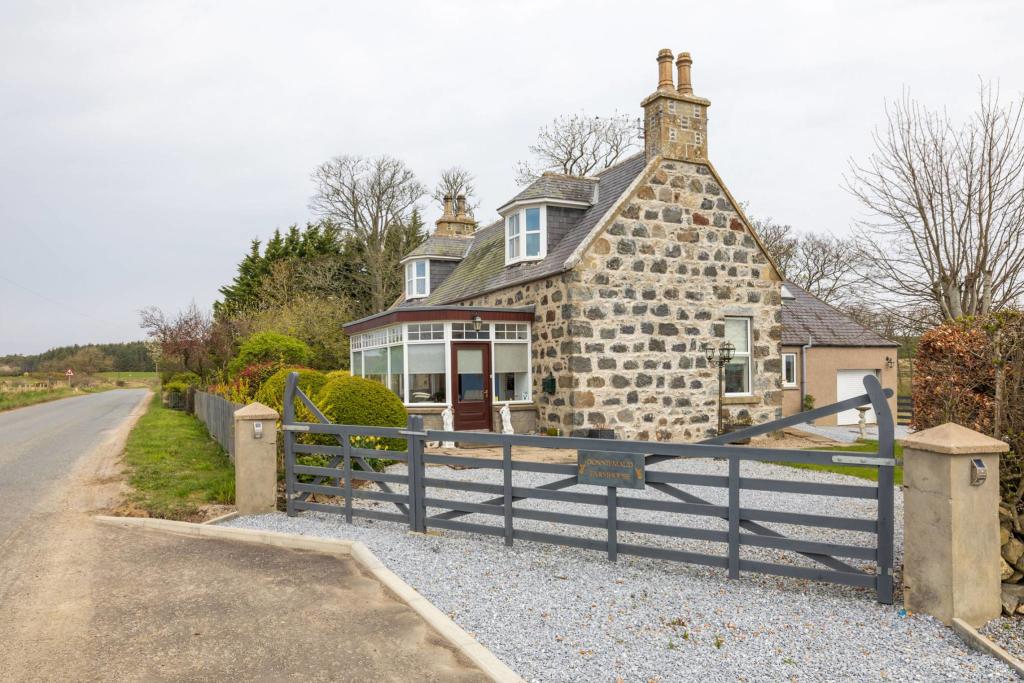 5 bedroom detached house for sale in Donniemaud Farmhouse Cornhill