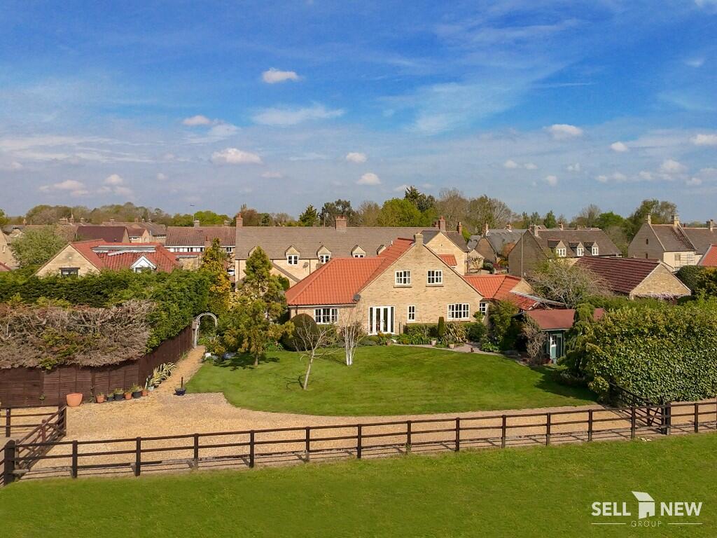 Main image of property: **2 ACRE PLOT, WITH BARN/STABLE BLOCK** Elm Cottage, Woodgate Lane, PE6