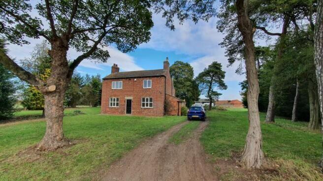 Main image of property: Slate House Farm, Holme, Scunthorpe