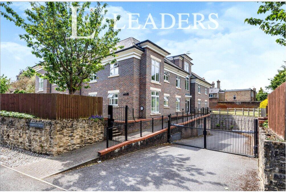 Main image of property: Herons Crest, Cross Lanes, Guildford