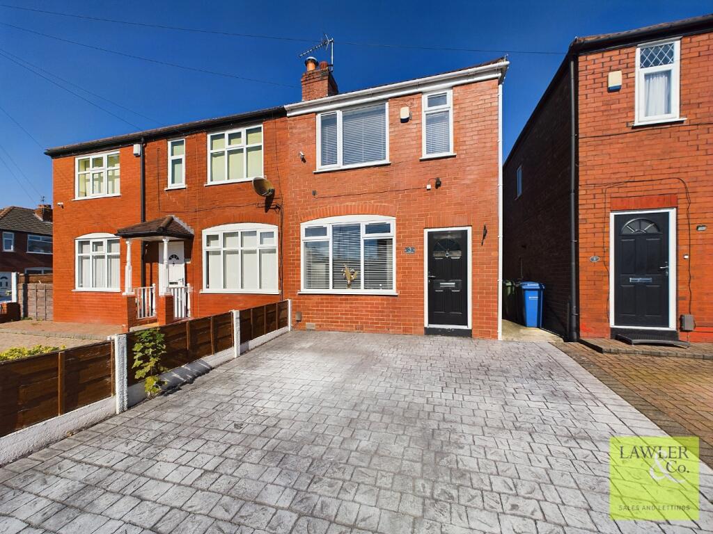 Main image of property: Hartland Close, Stockport, Cheshire, SK2 5BB