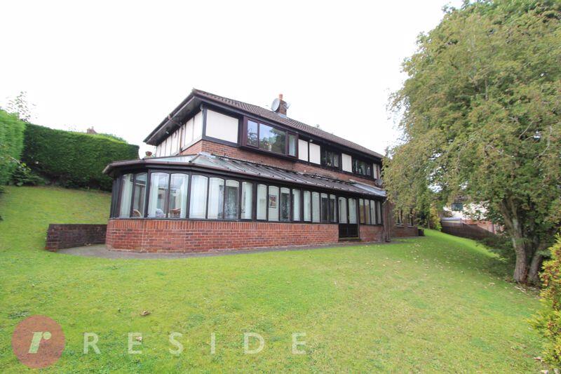 Main image of property: MOOR HILL, Norden, Rochdale OL11 5YB