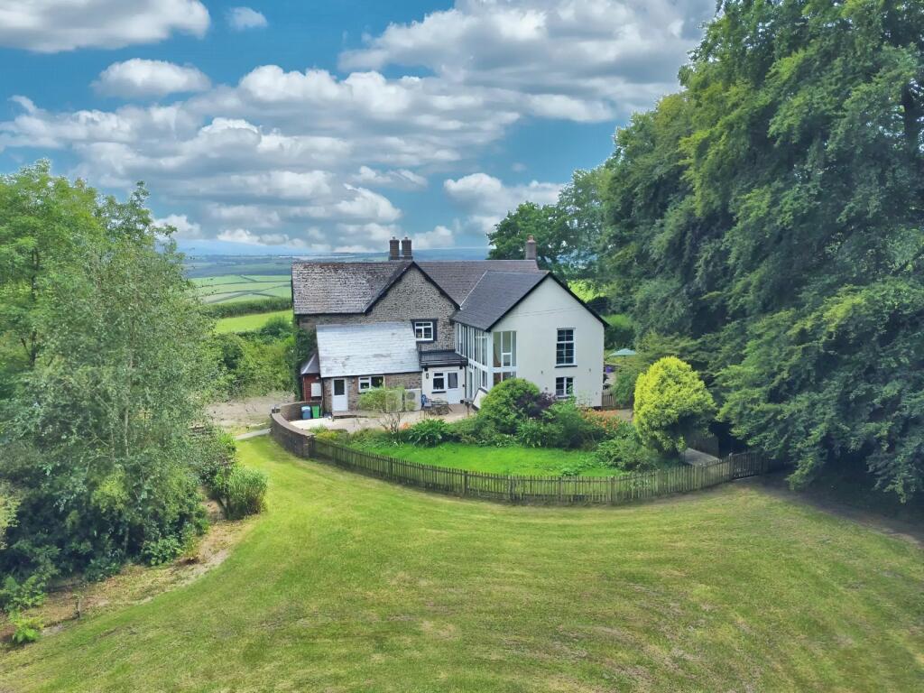 Main image of property: The Lodge, Ashbury, Okehampton