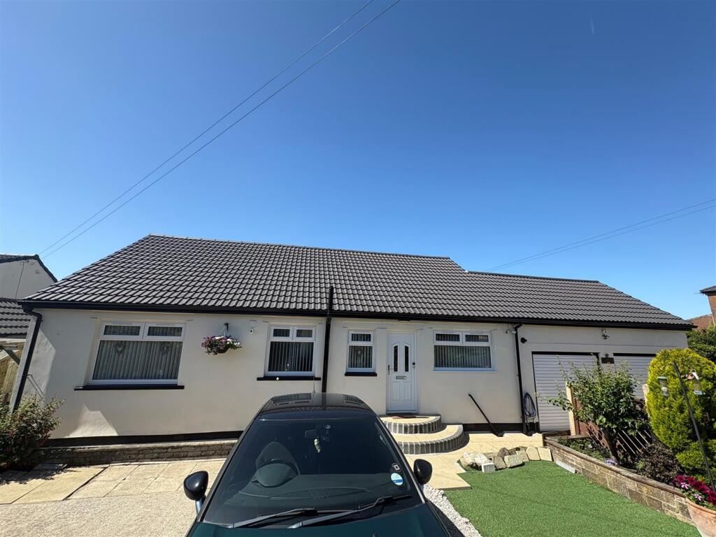 Main image of property: Hainsworth Moor Crescent, Queensbury