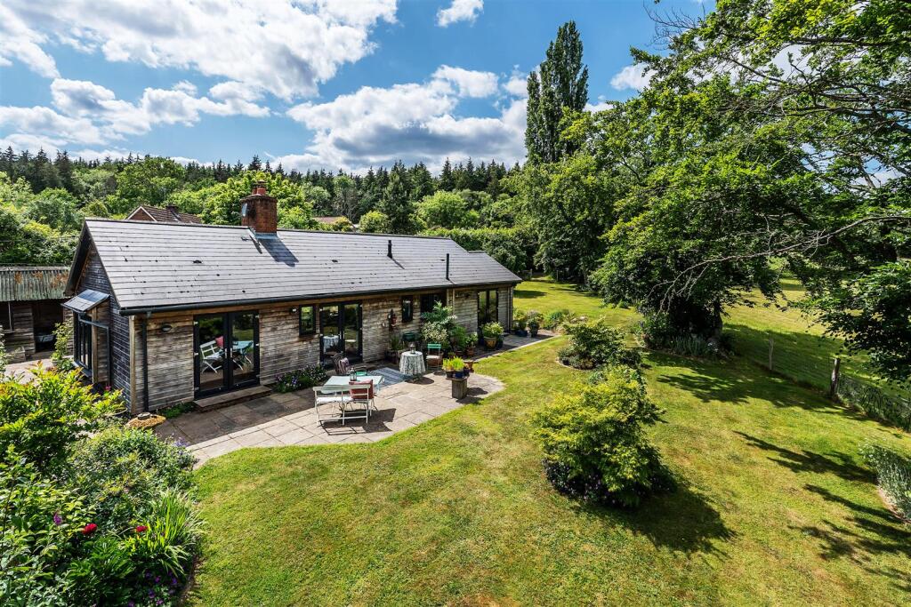 Main image of property: REDLANDS, MID HOLMWOOD, RH5