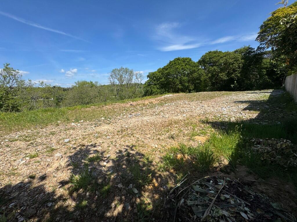 Main image of property: FOR SALE BY AUCTION 12 JUNE 2025 - ST AUSTELL, HOLMBUSH, PL25 3GA - SITE FOR 4 DWELLINGS