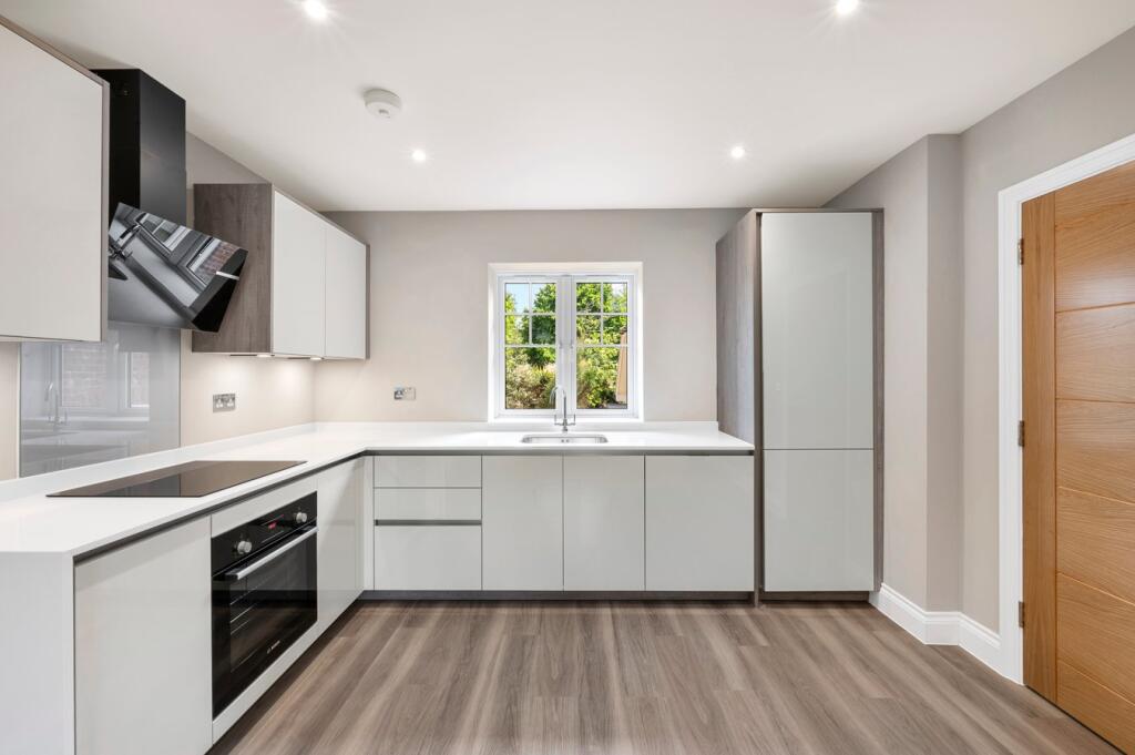 Main image of property: Queens Road, Weybridge, KT13