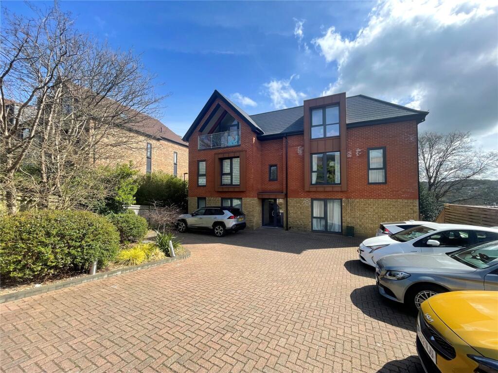 Main image of property: Woodcote Grove Road, Coulsdon, CR5