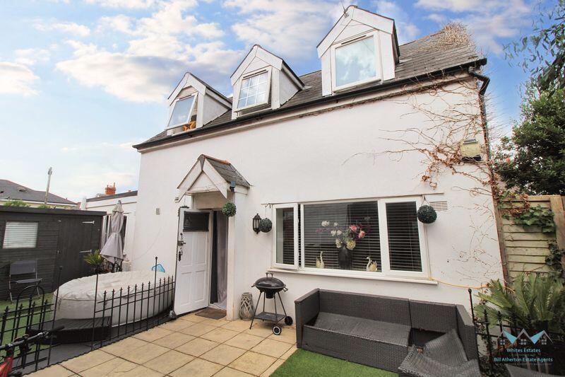 Main image of property: Malmesbury Park Road, Charminster - Spacious Five-Bedroom Detached Coach House in Secluded Gated Setting