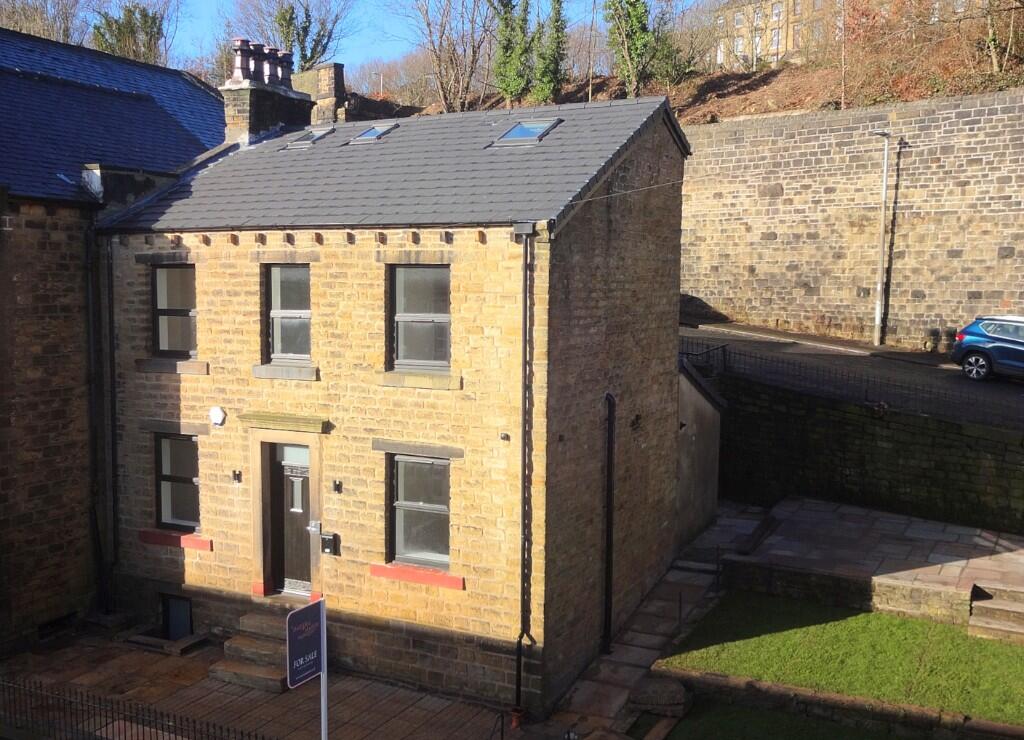 Main image of property: 56 Carr Lane, Slaithwaite, HD7 5AG