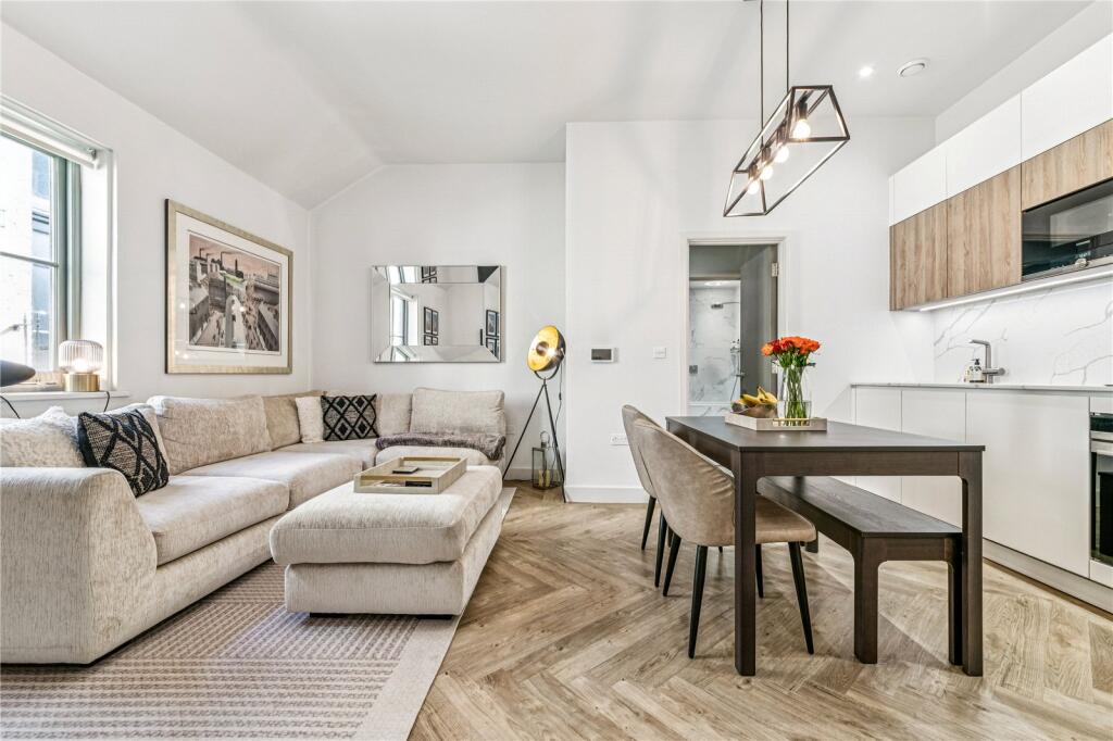 Main image of property: Holt Gardens, SW17