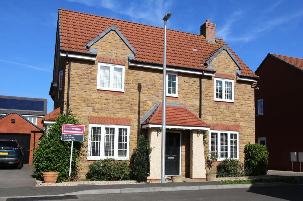 Main image of property: Exceptional modern family home in Yatton's popular Chestnut Park