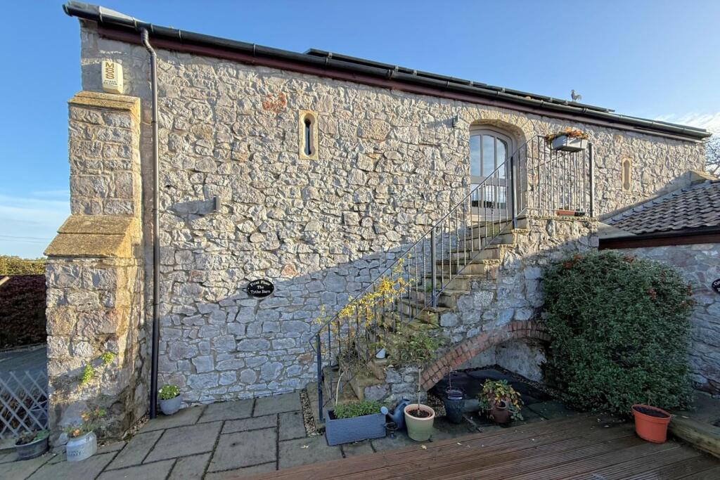 Main image of property: A charming period barn conversion offering character, comfort and contemporary living in the rural setting of West Hewis