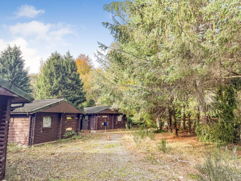 Main image of property: Riverside Log Cabins Dunira