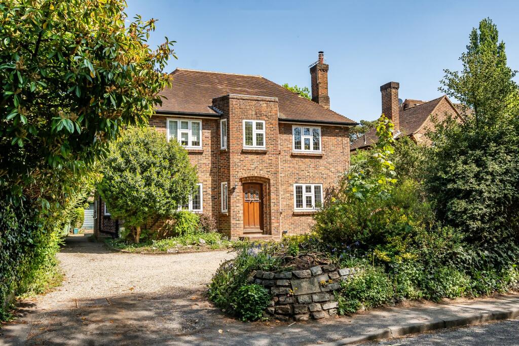Main image of property: 26 Woodfield Lane, Ashtead, KT21