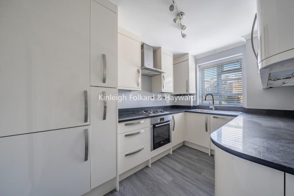 Main image of property: Esher Gardens, London, SW19
