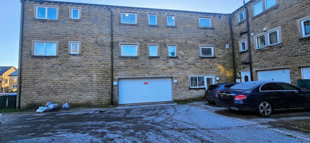 Main image of property: Old Clock Mill Court, Denholme, Bradford