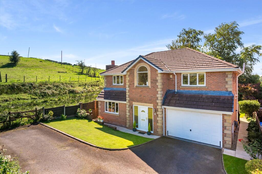 Main image of property: St. Georges Mount, Bury, BL9 – Stunning 4-Bed Detached with Views, Double Garage & No Chain
