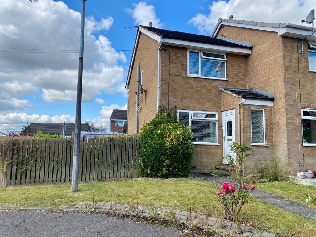 Main image of property: Woodlands Close, Huddersfield