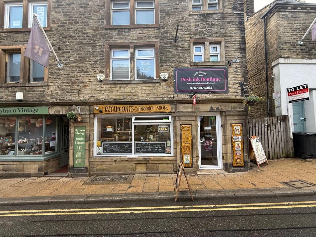 Main image of property: 95-99A Halifax Road, Ripponden, HX6 4DA