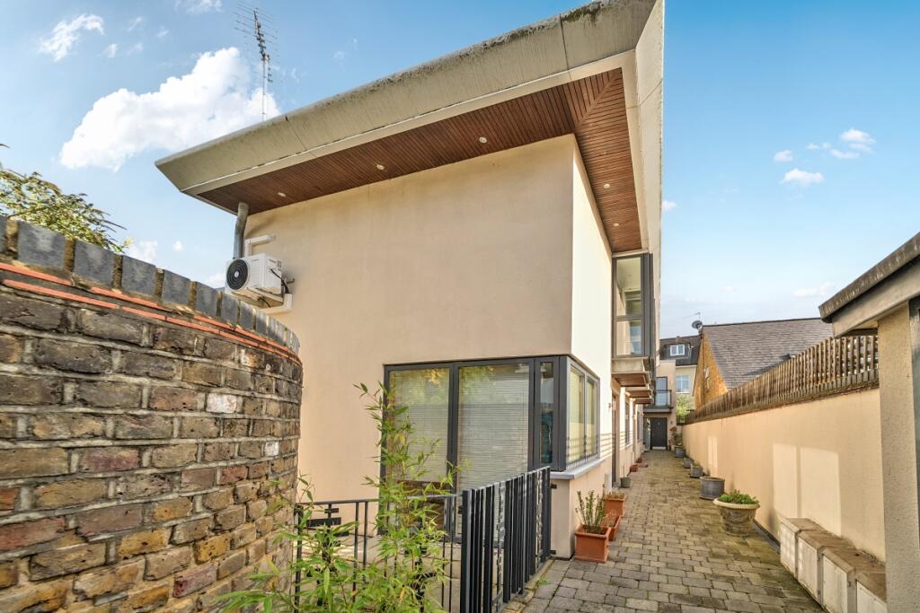 Main image of property: Elmgrove Mews Weybridge KT13