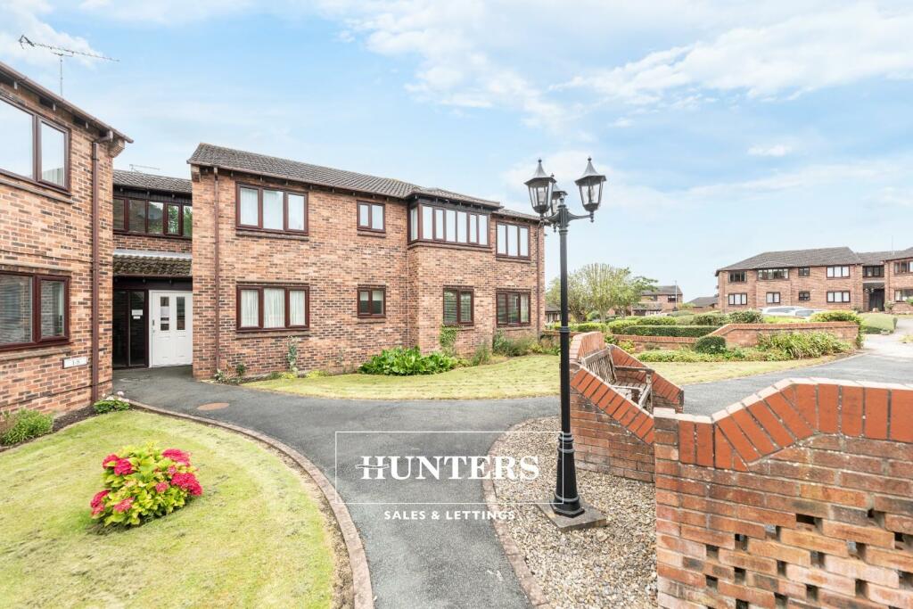 Main image of property: Woodlands Court, Kippax