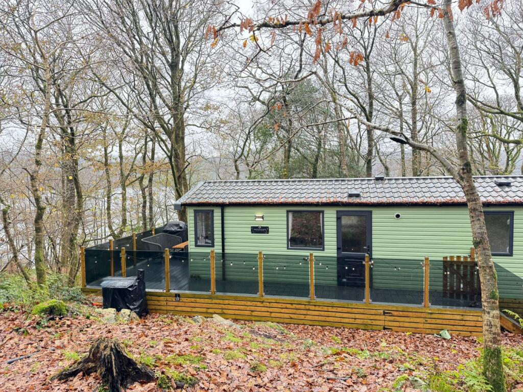 Main image of property: Tower Wood, Windermere, LA12