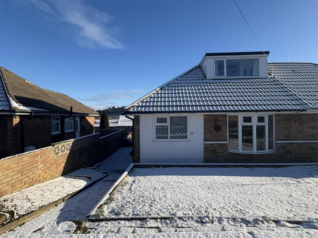 Main image of property: 9 Close Lea Drive, Rastrick, HD6 3AP