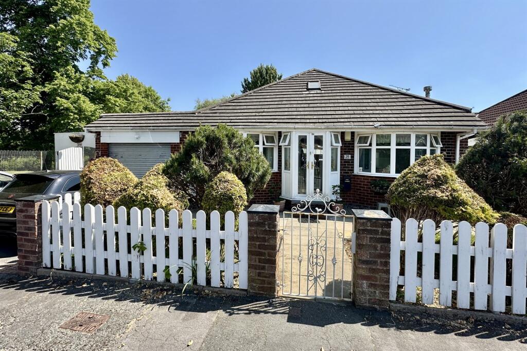 Main image of property: Rose Vale, Heald Green, Stockport