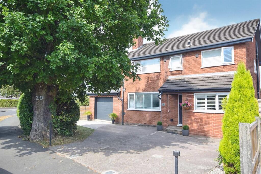 Main image of property: Radnormere Drive, Cheadle Hulme