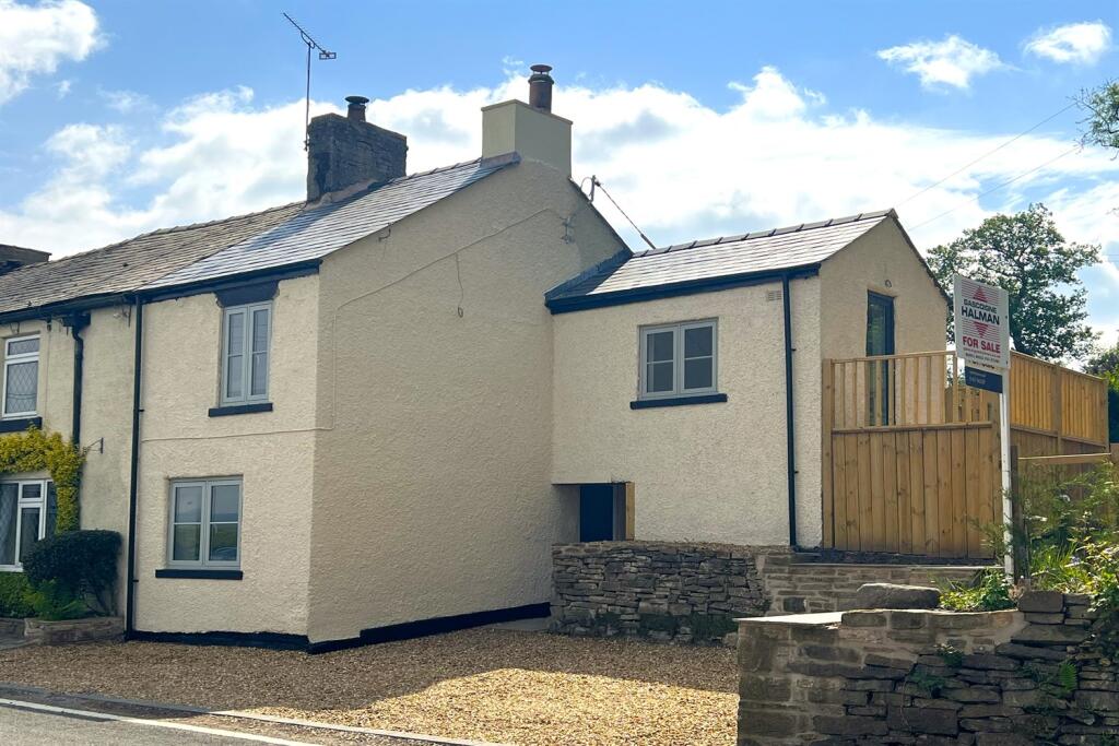 Main image of property: Brick Houses, Marple Road, Chisworth, Glossop