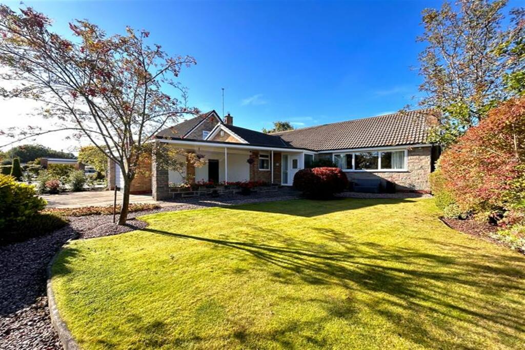 Main image of property: 14 Thorngrove Drive, Wilmslow, SK9