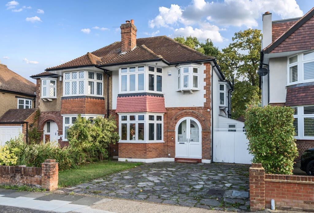 Main image of property: Highdown, Worcester Park, KT4